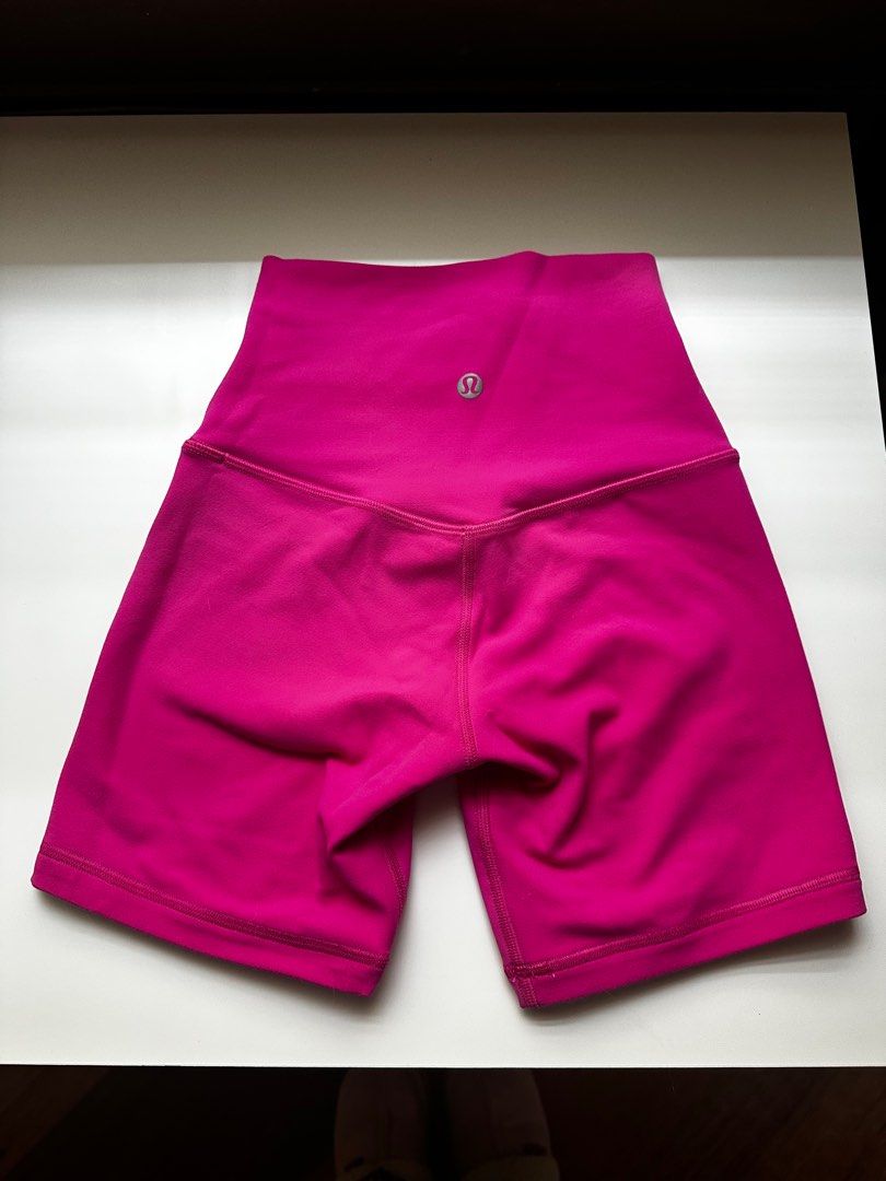 Lululemon Hot Pink Athletic Shorts Size 0 (Category: Shorts) located in Binan City. Submitted by bychessy (Listing ID 1469776085, Image 2). Description: - Brand: Lululemon - Style: High-rise athletic shorts - Color: Bright pink - Size: 0 - Features: Classic logo on back waistband, soft and stretchy fabric - Condition: never worn .