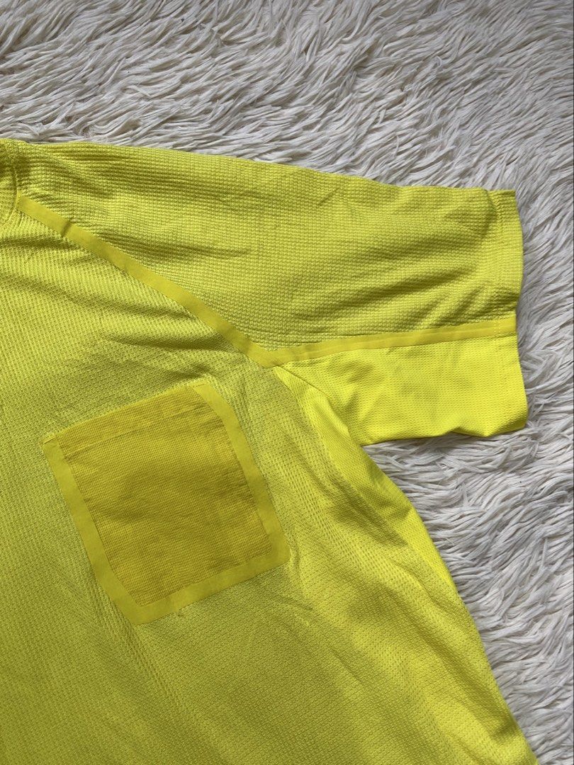 Lululemon ventilated pocket tee (Category: Tshirts & Polo Shirts ) located in Antipolo. Submitted by switchneighborhood (Listing ID 1469818266, Image 3). Description: Lululemon athletic tee in bright yellow. Short sleeves, textured waffle knit fabric, crew neckline. Handy chest pocket on the left side. Black lululemon logo patch near the bottom hem on the back. Regular fit, great breathable material for workouts or casual wear..