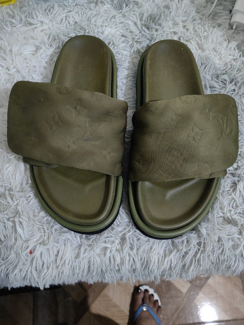 LV Slide (Category: Slippers & Slides) located in Dalaguete. Submitted by alloutlove (Listing ID 1469768406, Image 1). Description: LV moss green coded slide slightly used size 9 pwd 10 can be adjusted very comfy to wear..
