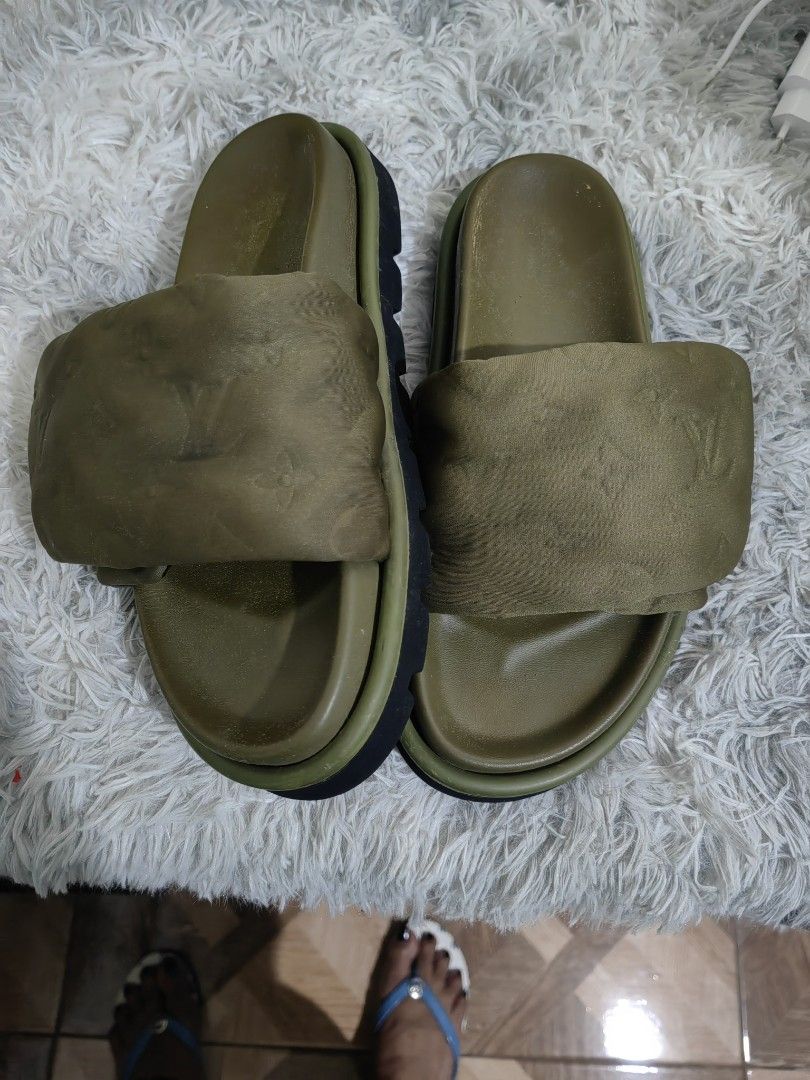 LV Slide (Category: Slippers & Slides) located in Dalaguete. Submitted by alloutlove (Listing ID 1469768406, Image 2). Description: LV moss green coded slide slightly used size 9 pwd 10 can be adjusted very comfy to wear..