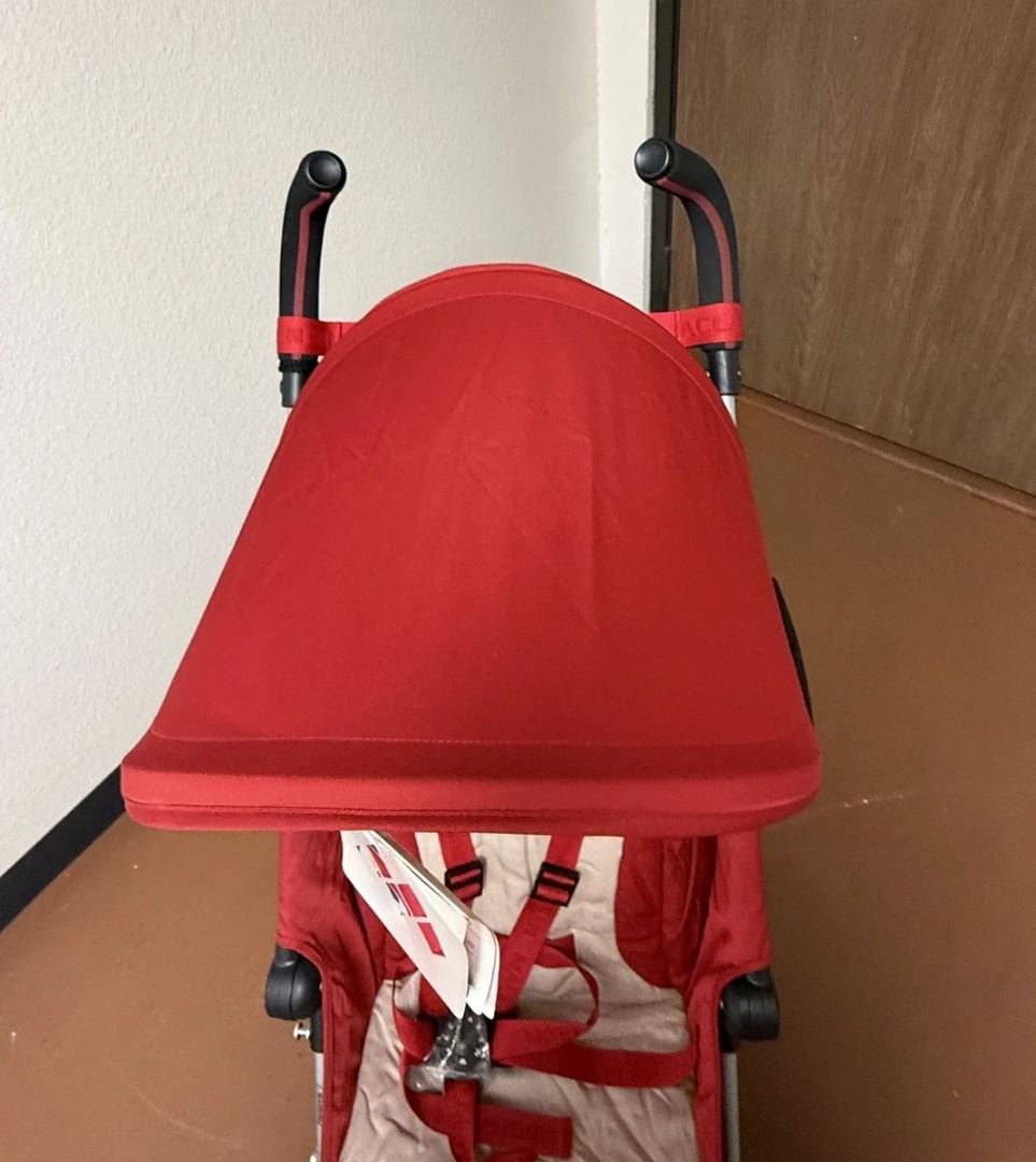 Maclaren Quest Stroller Red and Beige (Category: Strollers) located in Manila. Submitted by vashtardo (Listing ID 1469932844, Image 2). Description: - Brand: Maclaren Quest stroller - Colorway: Red and beige - Condition: Like new, original tags still attached on handlebars - Design: Lightweight, foldable umbrella style for easy carrying - Features: Attached canopy, safety harness straps, and back storage pocket - Performance: Smooth-rolling wheel