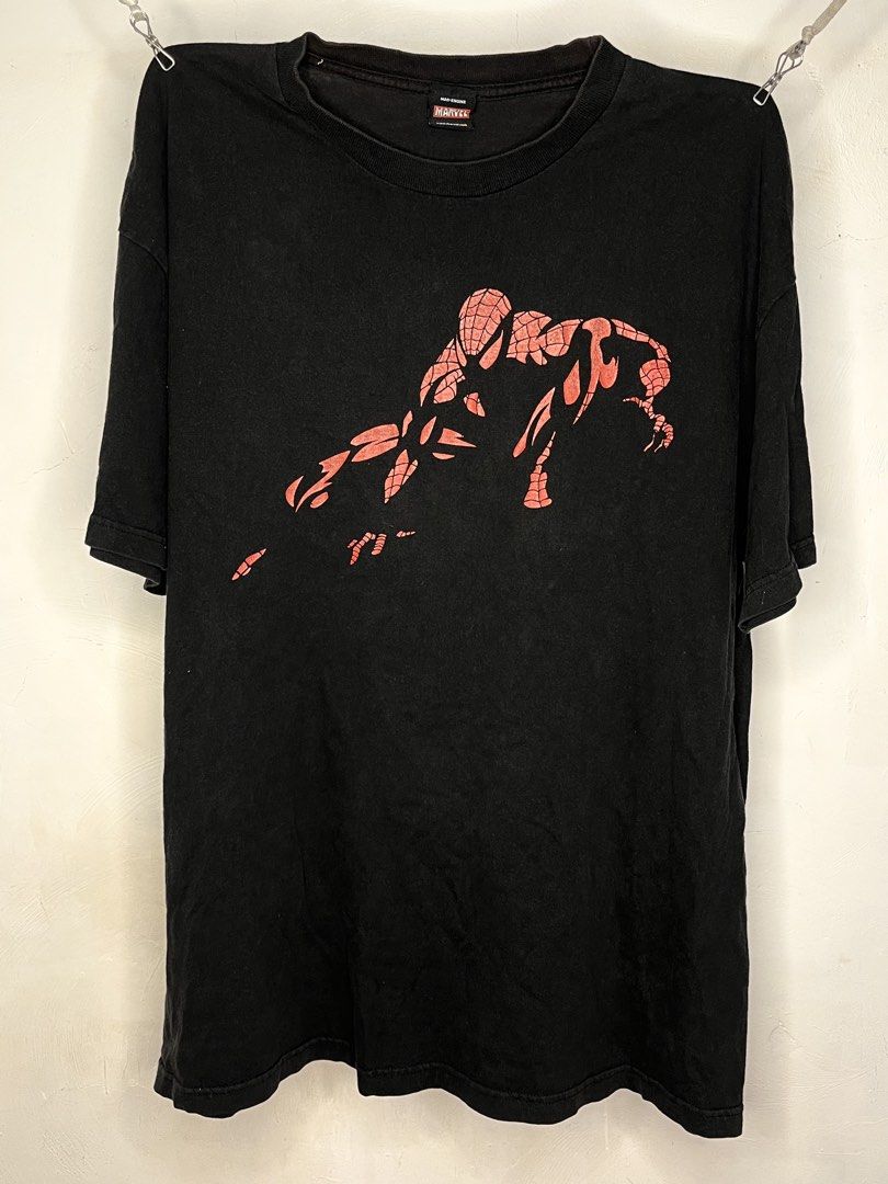 Mad Engine Marvel Spider-Man Black Graphic T-Shirt (Category: Tshirts & Polo Shirts ) located in Cavite. Submitted by ozzyozzx (Listing ID 1469881330, Image 1). Description: - Authentic Mad Engine x Marvel Spider-Man t-shirt - Color: Black - Graphic: Spider-Man crouching pose with red web pattern - Fit: Short sleeves, crew neck collar - Details: Official branding and Marvel website URL on tag - Style: Casual wear for everyday use.
