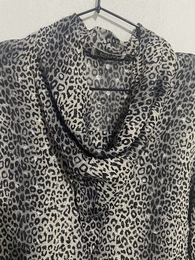 Mahtari leopard silk top (Category: Blouses) located in Davao. Submitted by mj_designervintagecurator (Listing ID 1469769776, Image 3). Description: 📌In good condition 📌shoulder 16- bust 40- armpit 20 - length 27 inches.