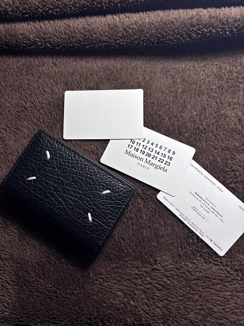 Maison Margiela Four Stitch Wallet (Category: Wallets & Card Holders) located in Manila. Submitted by royd15p (Listing ID 1469862588, Image 1). Description: .
