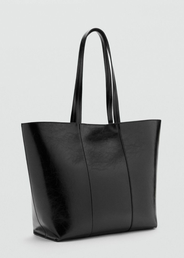 Mango Large Shopper Bag (Category: Tote Bags) located in Pasig City. Submitted by beasarmie (Listing ID 1469879283, Image 1). Description: https://shop.mango.com/ph/en/p/women/bags/shoppers/large-shopper-bag/27051342/99/00 Brand new with tag, no other inclusions. It's your basic black large tote bag. Check the link for more information..