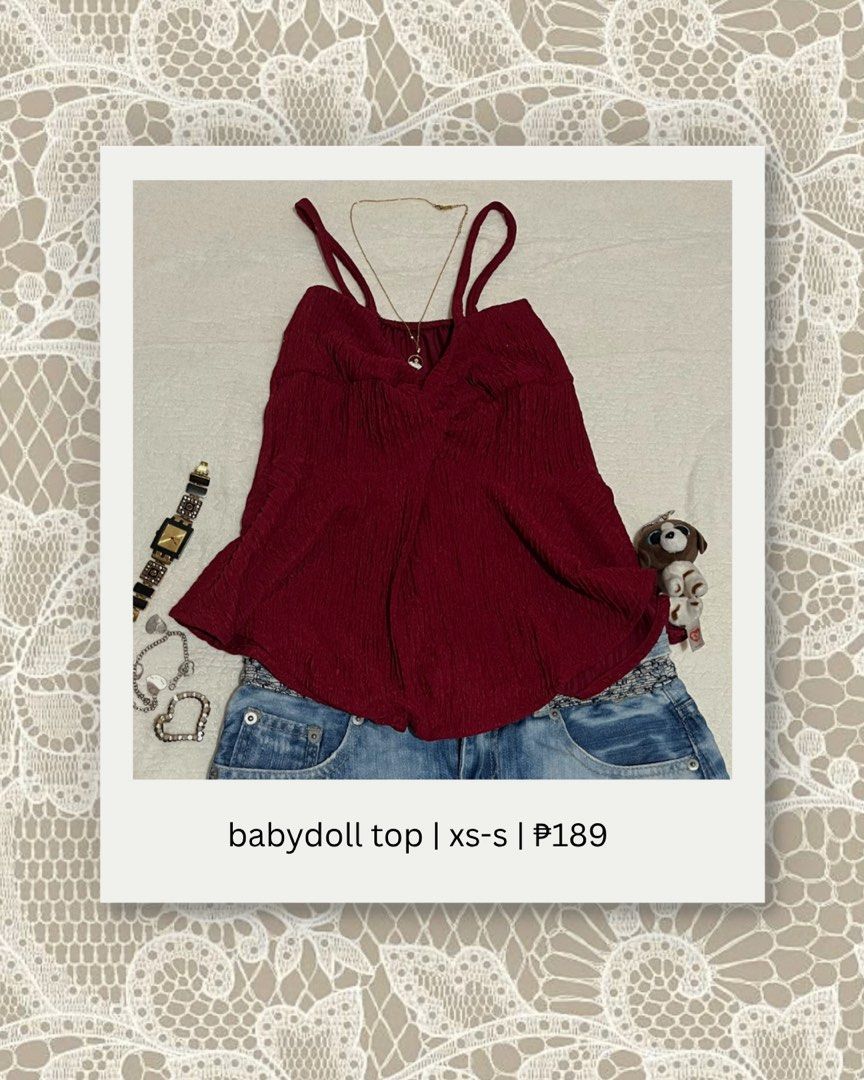 maroon babydoll top xs-s (Category: Blouses) located in Manila. Submitted by yours_eventually (Listing ID 1469907126, Image 1). Description: - Color: Maroon - Style: Cami babydoll top with spaghetti straps and a flared hem - Details: Textured crinkled fabric with a gathered twist front - Size: Fits extra small to small frames comfortably - Condition: Clean and ready to wear.