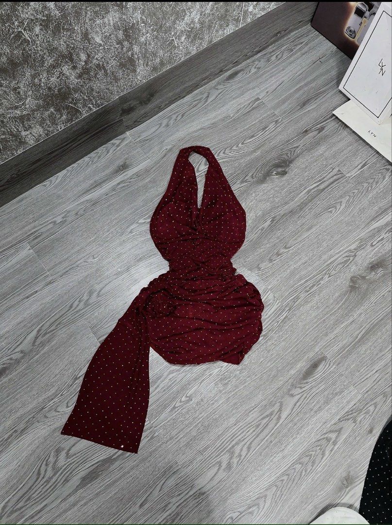 Maroon Rhinestone Halter Neck Ruched Mini Dress (Category: Dresses) located in Las Pinas. Submitted by niki.niki. (Listing ID 1469877355, Image 1). Description: - Color: Deep maroon with all-over sparkling rhinestones - Style: Halter neck, plunging front, and stylish side drape - Fit: Fully ruched body for a flattering, fitted shape - Material: Soft and stretchy for comfortable wear - Perfect for: Evening outs, parties, and special occasions xtra