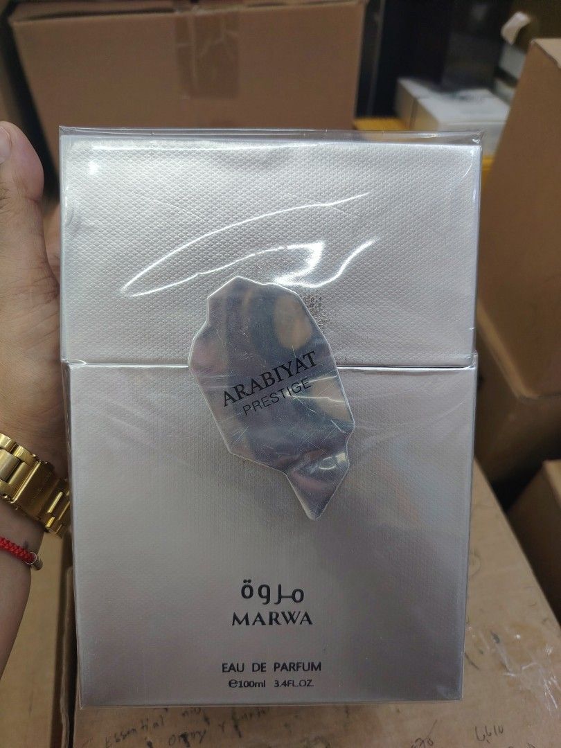 Marwa Arabiyat Prestige Eau De Parfum 100ml (Category: Fragrance & Deodorants) located in Pasay City. Submitted by perfume.ph (Listing ID 1469822425, Image 3). Description: - Brand: Arabiyat Prestige - Name: Marwa - Type: Eau de Parfum (EDP) - Size: 100ml / 3.4 fl oz - Top Notes: Bergamot, Petitgrain, Ginger - Heart Notes: Geranium, Tea, Incense - Base Notes: Guaiac Wood, Ambroxan, Musk - Condition: Brand new, silver packaging, factory-sealed in 