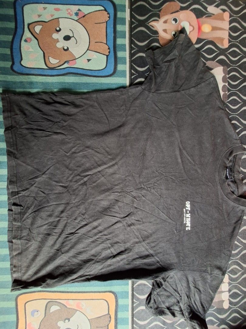 Master Number Off-White Graphic T-Shirt Black (Category: Tshirts & Polo Shirts ) located in San Francisco. Submitted by manu2025 (Listing ID 1469842111, Image 1). Description: - Brand/Style: Master Number black t-shirt with Off-White front and back graphic print - Fit: Relaxed fit with short sleeves and ribbed crew neck - Material: Comfortable cotton (shows slight fading from wash and wear) - Size/Measurements: Pit to pit 22 inches, Length 27 inc
