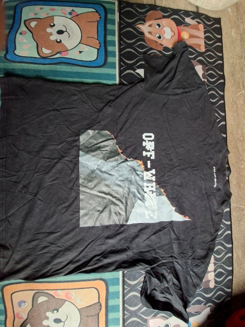 Master Number Off-White Graphic T-Shirt Black (Category: Tshirts & Polo Shirts ) located in San Francisco. Submitted by manu2025 (Listing ID 1469842111, Image 2). Description: - Brand/Style: Master Number black t-shirt with Off-White front and back graphic print - Fit: Relaxed fit with short sleeves and ribbed crew neck - Material: Comfortable cotton (shows slight fading from wash and wear) - Size/Measurements: Pit to pit 22 inches, Length 27 inc
