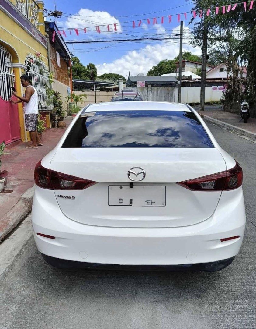Mazda 3 1.5 Sedan Standard (A) (Category: Used Cars) located in Manila. Submitted by marie_lubby (Listing ID 1469792293, Image 3). Description: 2016 Mazda 3 Skyactiv 1.5 Automatic tranny 48k mileage Push start No issue (minor scratches only) Ice cold AC Complete original documents Open DOS Registered (till Jan 2027) Upgraded to android head unit (reverse cam) Well maintained on pms 100 guaranteed not flooded Newly replaced break pad 400k.