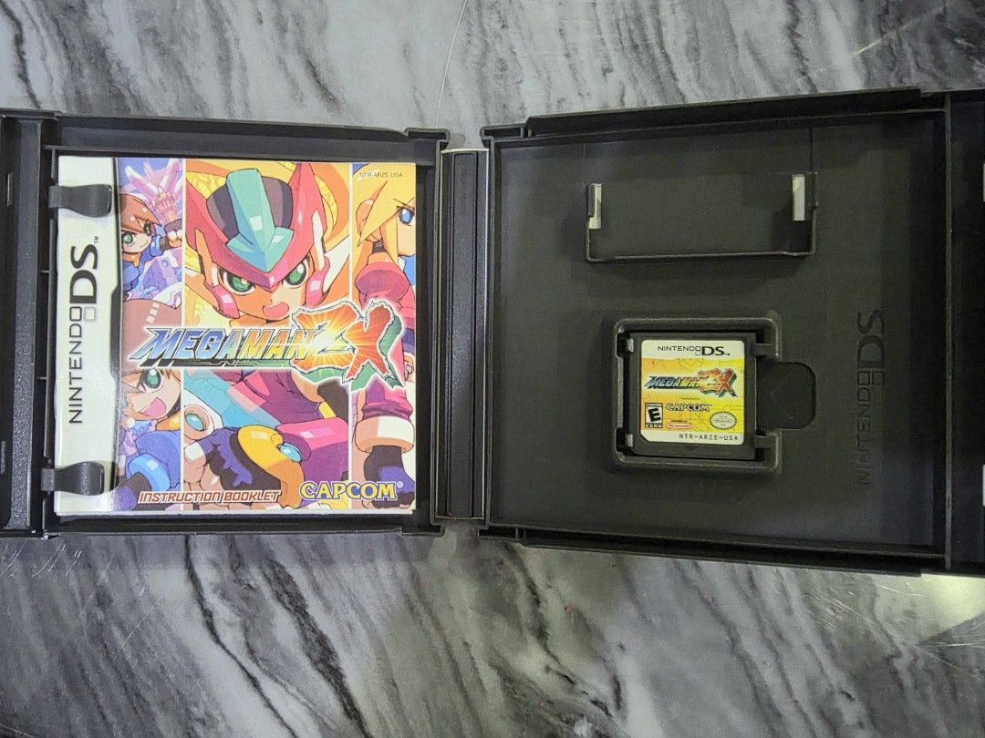 Mega Man ZX (Complete) for Nintendo DS 3DS (Category: Nintendo) located in Mandaluyong City. Submitted by chan.ningtatum (Listing ID 1469860318, Image 2). Description: For Sale! - Title: Mega Man ZX - Platform: Nintendo DS (USA Version) - Publisher: Capcom - Condition: Complete with original case, cartridge, and instruction booklet - Details: Clean box art and intact cartridge label - Genre: Classic action platformer Checkouts via Shope e and Laz