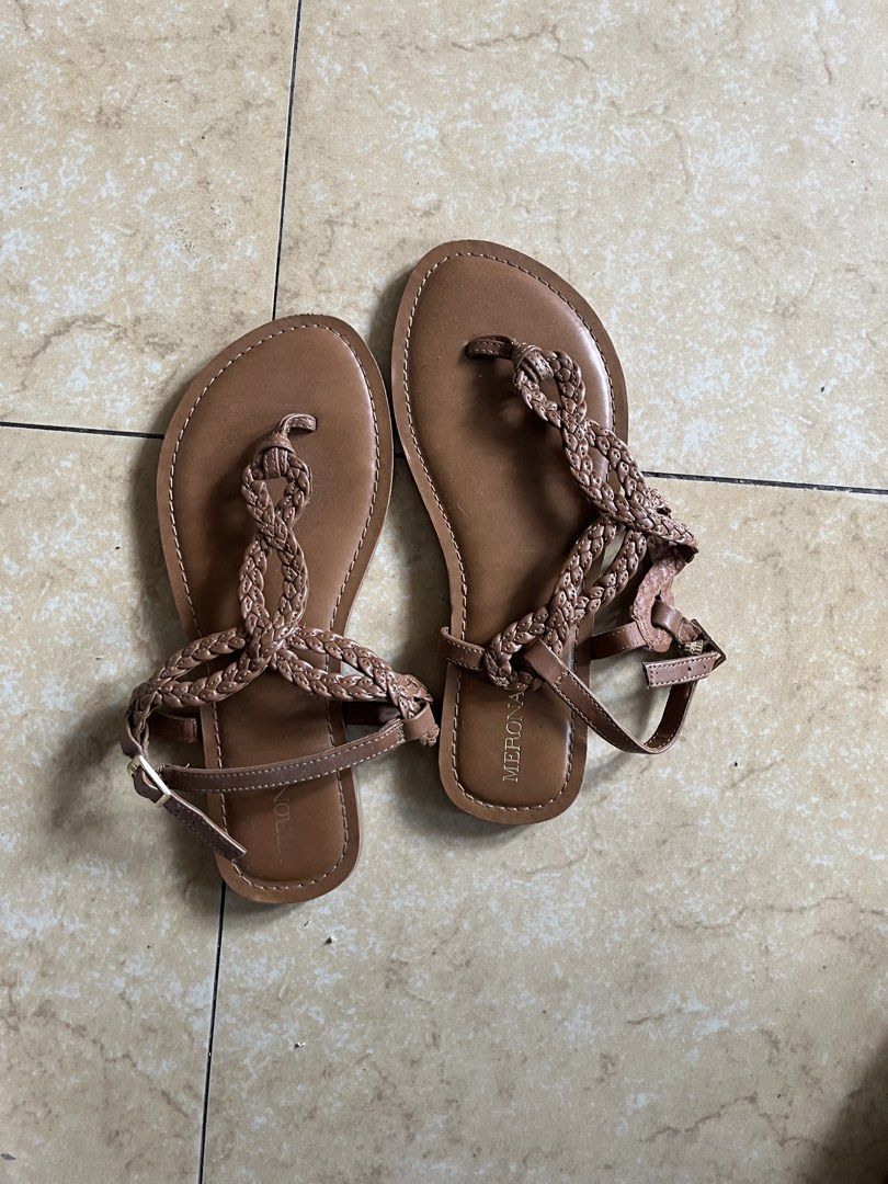 Merona Brown Braided Thong Sandals (Category: Flats & Sandals) located in Quezon City. Submitted by iamina16 (Listing ID 1469774432, Image 1). Description: - Brand: Merona - Size: 6.5W - Color: Brown - Style: Flat T-strap sandals with braided straps and side buckle closure - Condition: Soles show minor wear from walking, overall very comfortable for warm weather.