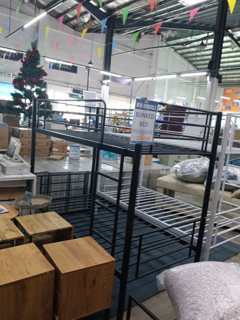 Metal Bunk Bed White or Black (Category: Bed Frames & Mattresses) located in Manila. Submitted by jesicahmrsantarosa (Listing ID 1469797024, Image 2). Description: - Price: ₱9,999 per unit - Colors available: White or black - Size: Standard twin (top and bottom berths) - Material: Sturdy metal construction with slatted base - Features: Solid ladder attached to the front - Ideal for: Shared bedrooms, dorms, and saving space.