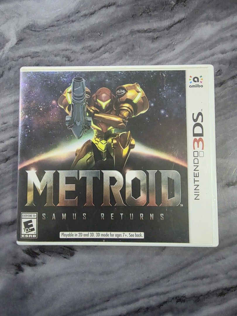 Metroid Samus Returns for Nintendo 3DS (Category: Nintendo) located in Mandaluyong City. Submitted by chan.ningtatum (Listing ID 1469860795, Image 1). Description: For Sale! - Game: Metroid Samus Returns (Physical cartridge with original case) - Platform: Nintendo 3DS (US Version) - ESRB Rating: Everyone 10+ (Cartoon Violence) - Features: amiibo compatible - Condition: Case artwork is in clean, excellent shape Checkouts via Shope e and Laz ada Av