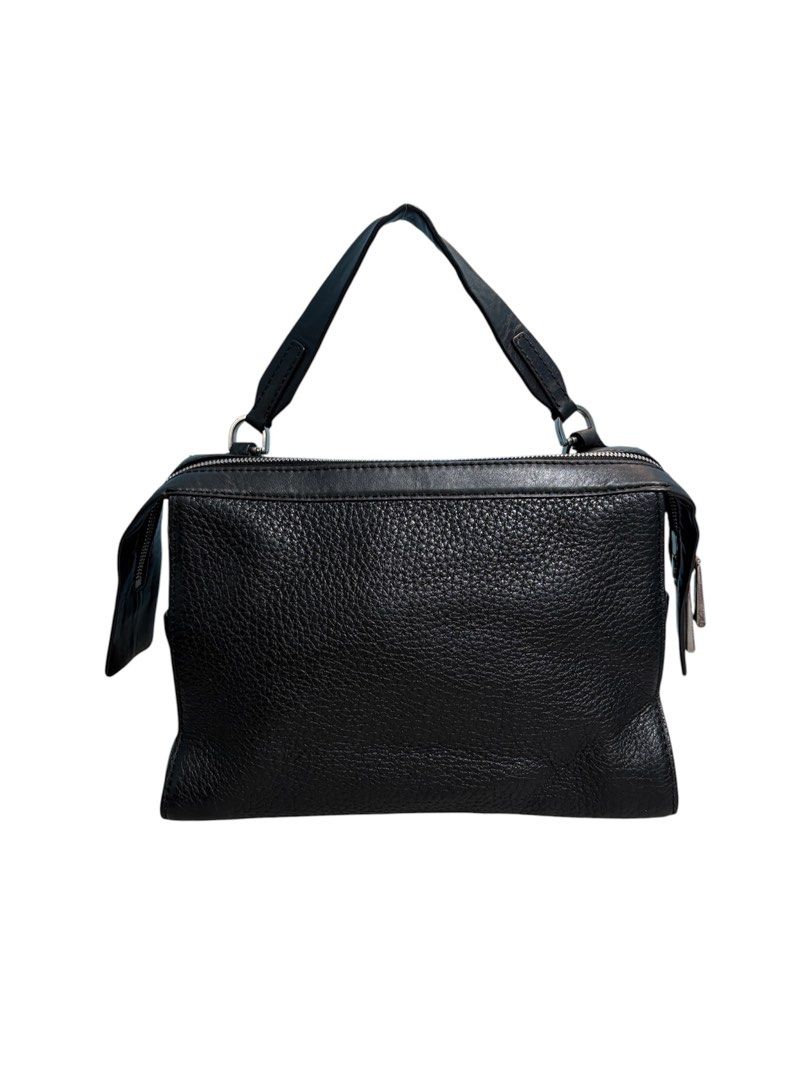 Michael Kors Ingrid Medium Leather Shoulder Bag (Category: Shoulder Bags) located in Cagayan de Oro. Submitted by thatsdopethrift (Listing ID 1469898743, Image 1). Description: Clean, spacious everyday bag that can be carried comfortably as a top handle or over-the-shoulder bag. Flaws: Missing the long adjustable crossbody strap. Selling as a top handle / short shoulder bag style only..
