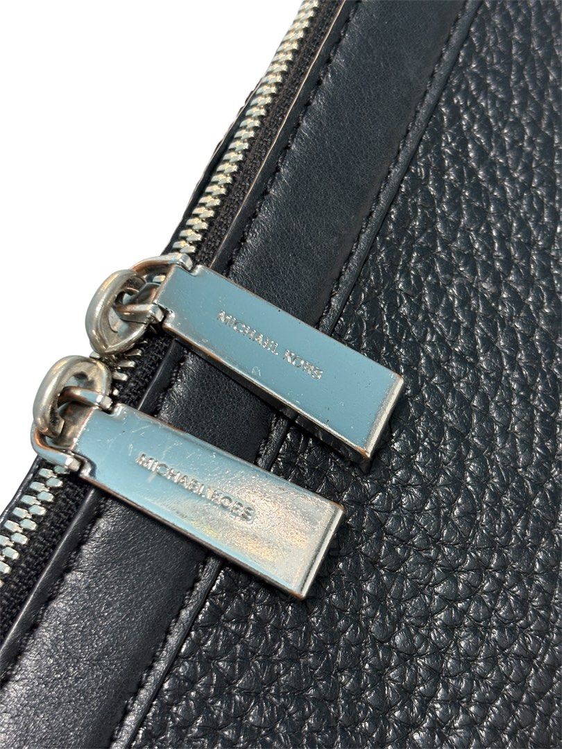 Michael Kors Ingrid Medium Leather Shoulder Bag (Category: Shoulder Bags) located in Cagayan de Oro. Submitted by thatsdopethrift (Listing ID 1469898743, Image 3). Description: Clean, spacious everyday bag that can be carried comfortably as a top handle or over-the-shoulder bag. Flaws: Missing the long adjustable crossbody strap. Selling as a top handle / short shoulder bag style only..