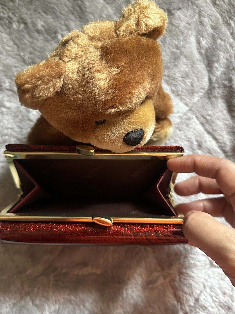 Michaela compact trifold wallet (Category: Wallets & Card holders) located in Cavite. Submitted by chicfinds.slay (Listing ID 1469827316, Image 3). Description: ✨never used nastock lang sa closet ✨box were thrown and wallet was store in unused stored bag ✨ rfs: impulsive buying ni mother ✨no flaws ✨compact w/card slots /waterproof shiny texture ✨magnet &kiss lock closure ✨can still pass as a gift .