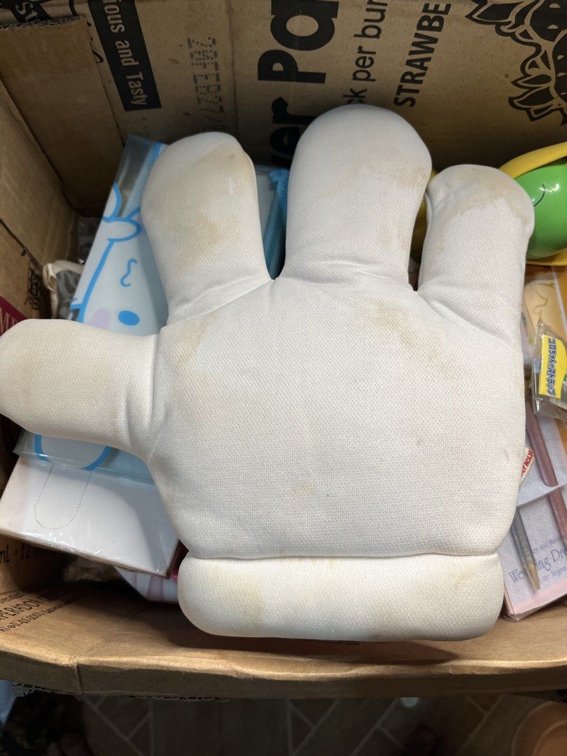 Mickey Mouse White Glove Hand Pillow Plush (Category: Plushies & Soft Toys) located in Gapan. Submitted by lunashop14 (Listing ID 1469836588, Image 3). Description: - Iconic Mickey Mouse white glove plush toy with classic three black stripes - Features original Mickey Mouse tag attached on the side - Standard cushion size made with soft, huggable material - Note: Has noticeable yellowing and stains due to long-term storage - Perfect for Disney co