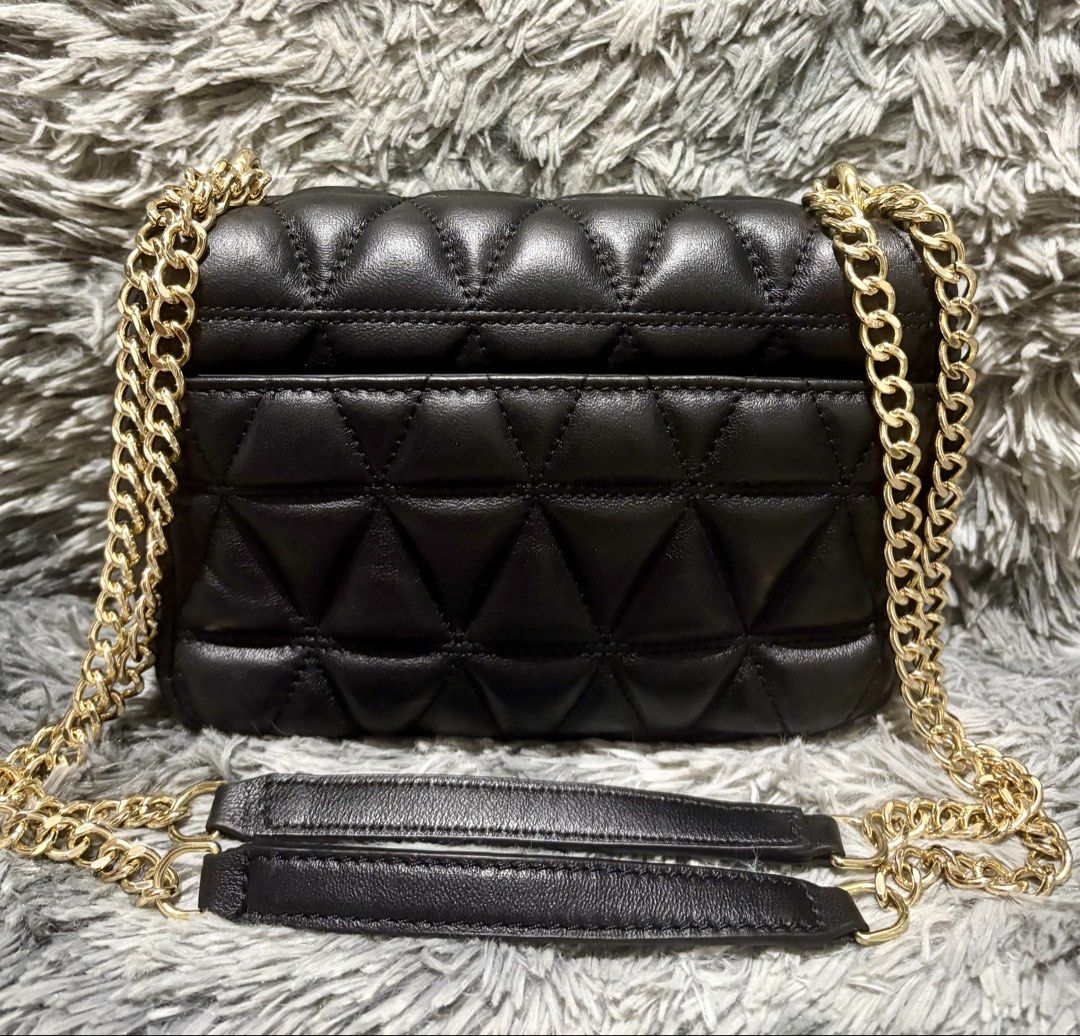 MK Sloan (Category: Luxury Bags & Wallets) located in Manila. Submitted by jlj_v.2_oshop (Listing ID 1469823438, Image 3). Description: ORIGINAL MK Sloan Quilted Small Chain Shoulder Bag in black leather with gold-tone hardware. Small size convertible crossbody/shoulder bag. .