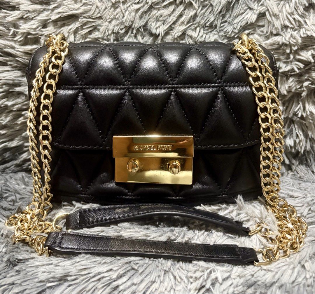 MK Sloan (Category: Luxury Bags & Wallets) located in Manila. Submitted by jlj_v.2_oshop (Listing ID 1469823438, Image 2). Description: ORIGINAL MK Sloan Quilted Small Chain Shoulder Bag in black leather with gold-tone hardware. Small size convertible crossbody/shoulder bag. .
