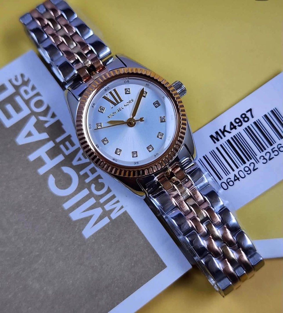 MK Tricolor Watch (Category: Women's Watches) located in Manila. Submitted by bagsandshoesmanymore (Listing ID 1469811892, Image 2). Description: MK Watch Tricolor Size 26mm Box, paperbag and tag card Stainless steel.