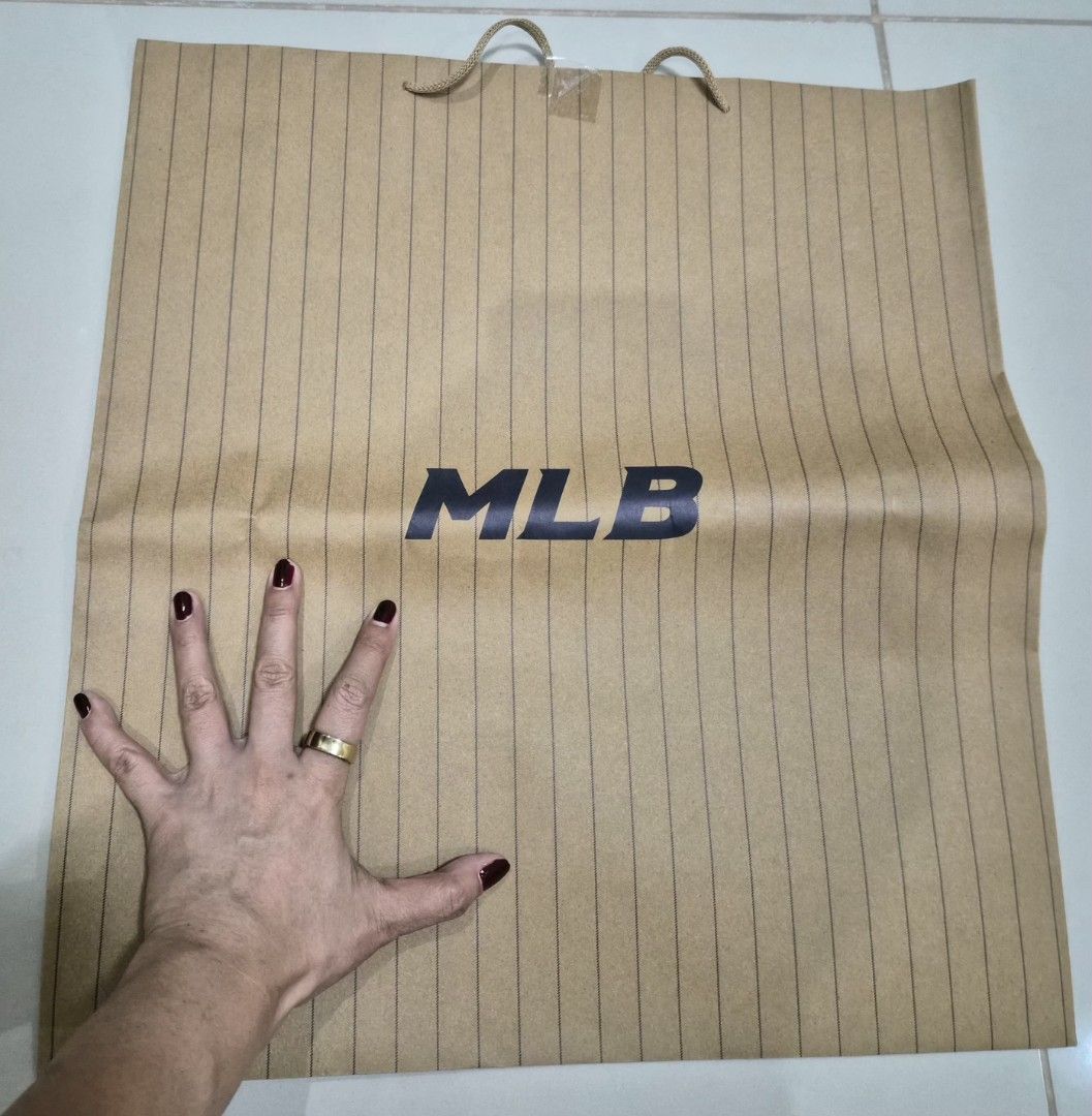MLB Brown Striped Paper Bag (Category: Everything Else Others) located in Paranaque City. Submitted by lovelife.312 (Listing ID 1469836253, Image 2). Description: ***PLEASE READ CAREFULLY*** - Authentic MLB large paper bag - decluttering room MAILING AND DELIVERY: - Meet up only SM City Sucat, Uptown Mall BGC and Ayala Malls by the Bay. - After lunch time 1pm onward. - If you prefer delivery, buyer will book courier and shoulder shipping fee. MOP