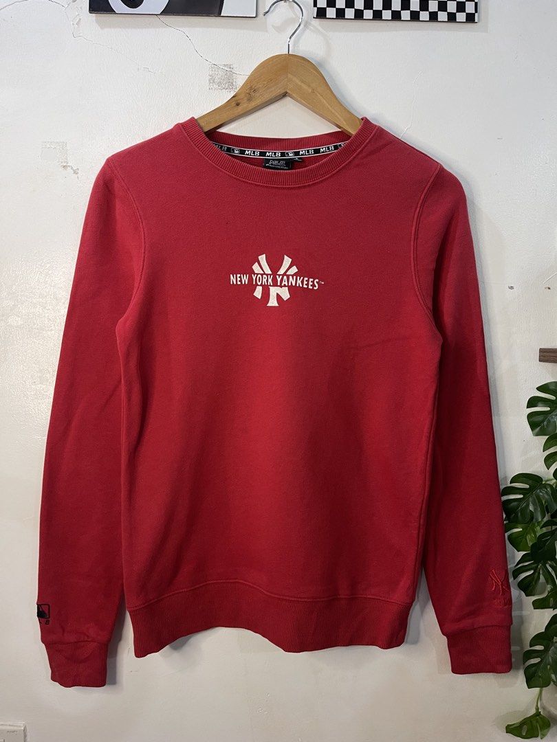 MLB New York Yankees Red Sweatshirt Size S (Category: Coats, Jackets and Outerwear) located in Cabagan. Submitted by blessingma81004 (Listing ID 1469769035, Image 2). Description: - Brand: MLB New York Yankees - Color: Red - Size: S (160/80A) | Chest width: 17.5" | Length: 24" - Design: Classic NY Yankees chest print, American flag patch on upper back collar, and MLB logo embroidery on sleeve cuff - Style: Comfortable everyday streetwear.