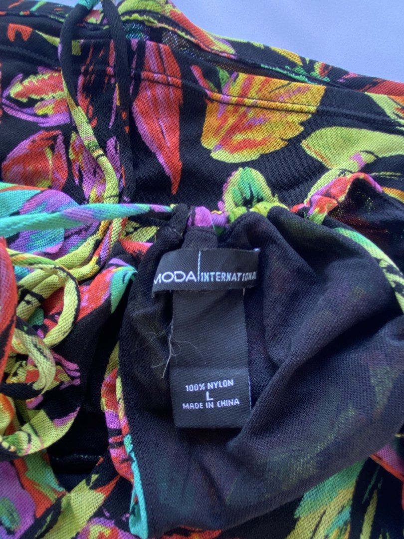 Moda International Floral Halter Top Size L (Category: Sleeveless) located in Cauayan City . Submitted by alt_olshop4 (Listing ID 1469833609, Image 3). Description: ♡ Moda International Rushed Printed Top ♡ Size: size large on tag Bust: 18" Width/waist: Length: 14" Brand: Moda International Condition/flaws: no major flaws M 289 S 320 G 350 Lock 480 Swipe/see comment section -> to see flaws Please read the following ♡ Read my pinned post before or