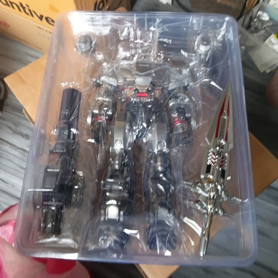 Monocrat MT-01B transformers Megatank megatron wd red sword variant (Category: Gundam & Model Kits) located in Manila. Submitted by raymondgwapotlga (Listing ID 1469815281, Image 3). Description: - Item: Monocrat MT-01B Megatank robot figure wd red sword variant - Condition: Box opened for content check only, figure and plastic trays are 100% untouched - Material: Heavy die-cast metal parts with detailed mechanical design - Accessories: Includes 
