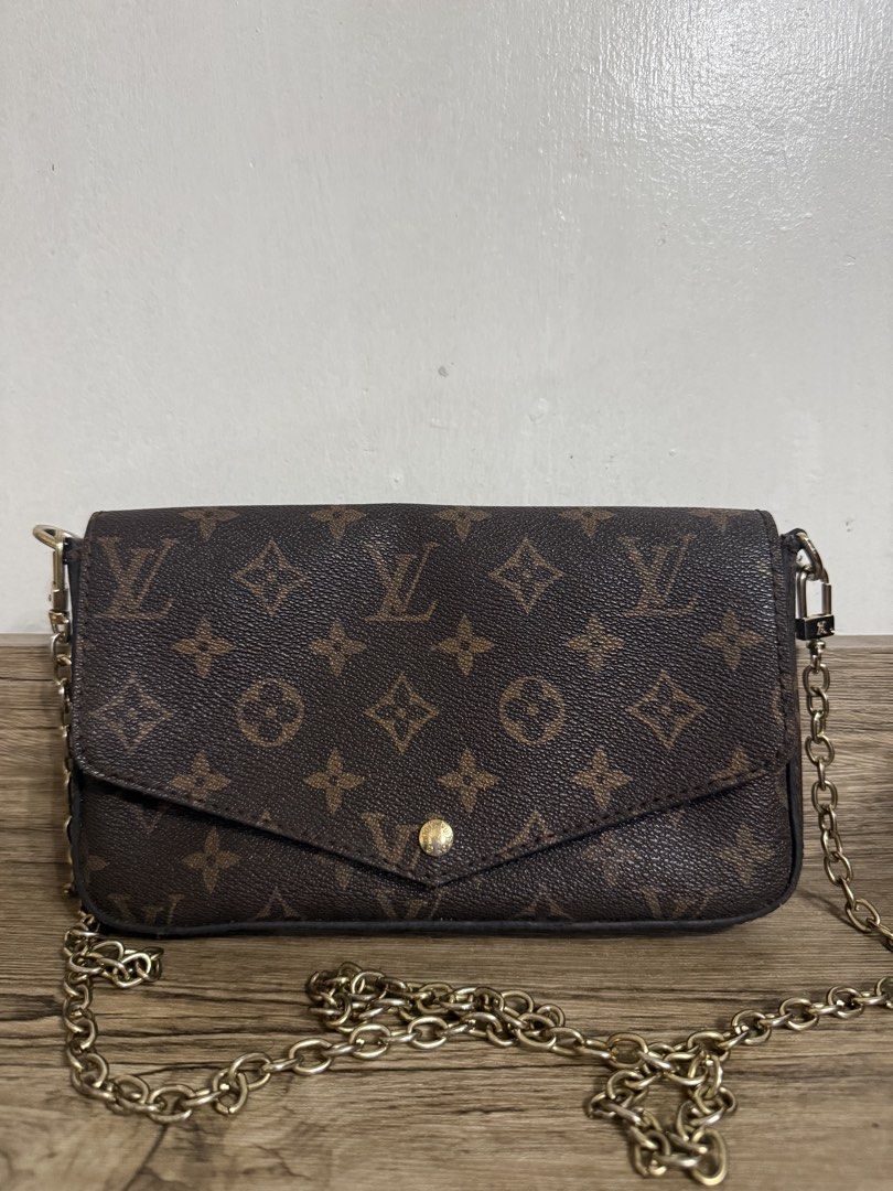 Monogram Sling Wallet (Category: Wallets & Card holders) located in Manila. Submitted by muggles_closet (Listing ID 1469871987, Image 1). Description: Faded hardware 7/10 Velvet red inside with scratched Body 9/10 no major flaw.