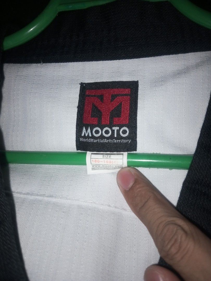 MOOTO Black Collar Dobok Taekwondo (Category: Combat Sports) located in Quezon City. Submitted by oshhh_ (Listing ID 1469925966, Image 2). Description: MOOTO Black collar dobok No Issues Size 180cm 1500.