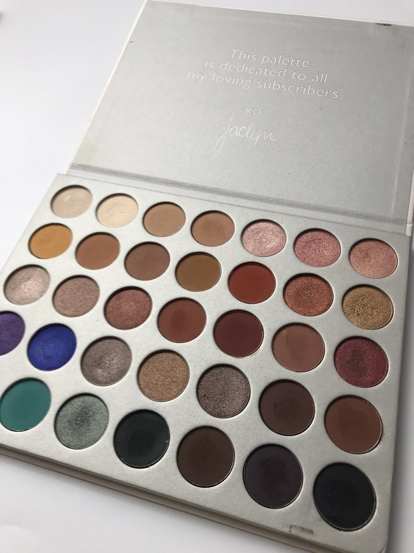 Morphe The Jaclyn Hill Eyeshadow Palette (Category: Makeup) located in Las Pinas. Submitted by taureandeclutter (Listing ID 1469895114, Image 3). Description: - Authentic Morphe x Jaclyn Hill Eyeshadow Palette - Features 35 stunning shades: warm neutrals and vibrant pops of color - Includes matte, shimmer, and metallic finishes - Comes with original outer cardboard sleeve (shows minor shelf wear and slight discoloration) - Powders are lightly swa
