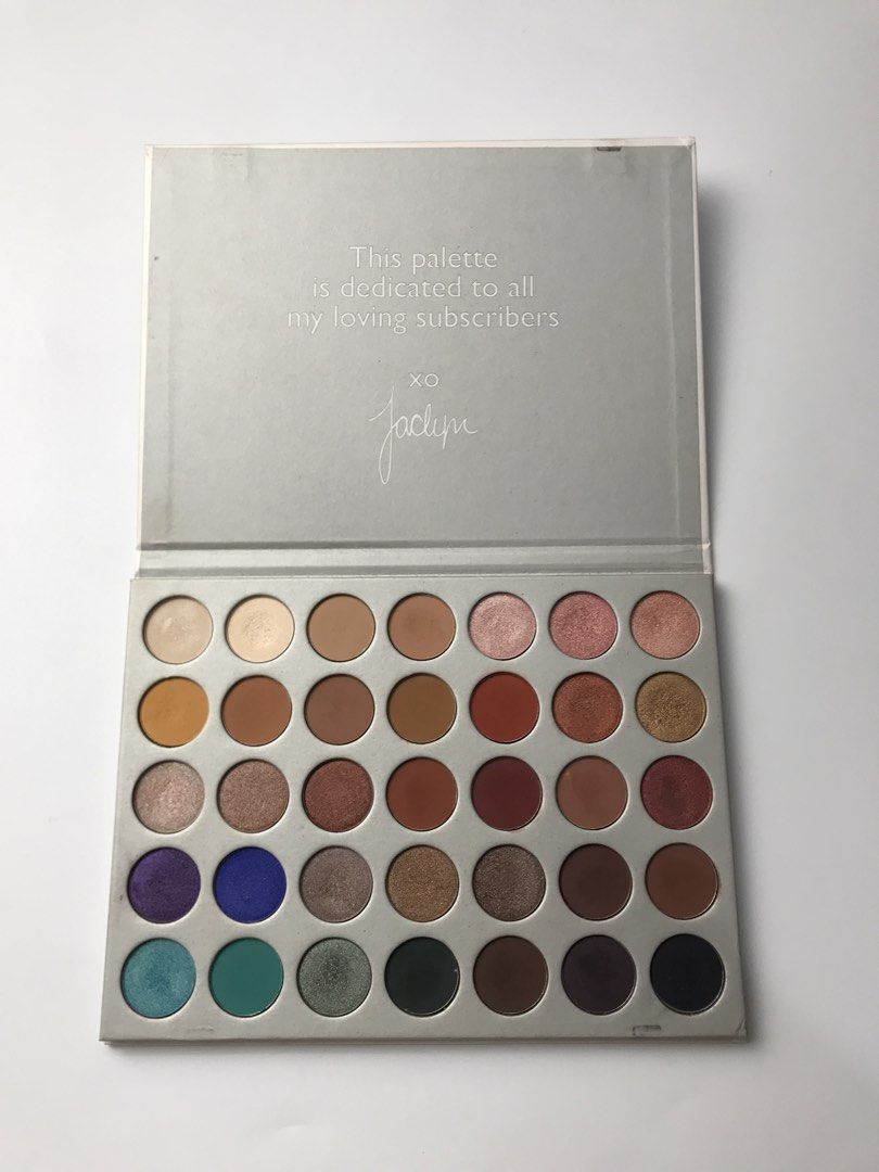 Morphe The Jaclyn Hill Eyeshadow Palette (Category: Makeup) located in Las Pinas. Submitted by taureandeclutter (Listing ID 1469895114, Image 1). Description: - Authentic Morphe x Jaclyn Hill Eyeshadow Palette - Features 35 stunning shades: warm neutrals and vibrant pops of color - Includes matte, shimmer, and metallic finishes - Comes with original outer cardboard sleeve (shows minor shelf wear and slight discoloration) - Powders are lightly swa