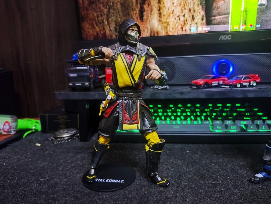 Mortal Kombat Scorpion & Sub-Zero Action Figures Set (Category: Figurines & Statues) located in Caloocan City. Submitted by rhaine4153 (Listing ID 1469814190, Image 2). Description: - Mortal Kombat iconic fighters: Scorpion and Sub-Zero - Detailed outfits with matching display stands included - Scorpion includes swords, sheath, and signature spear accessory - Sub-Zero includes blue-tinted ice weapons and alternate hands - Complete with original b