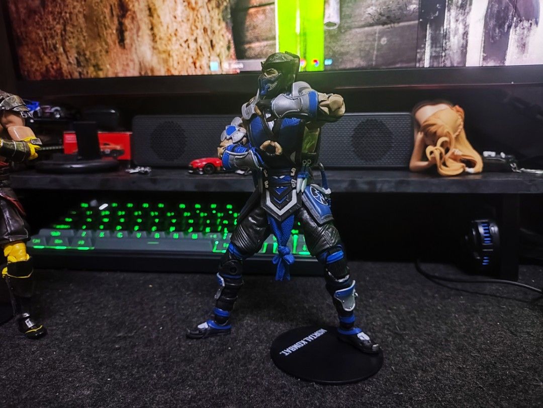 Mortal Kombat Scorpion & Sub-Zero Action Figures Set (Category: Figurines & Statues) located in Caloocan City. Submitted by rhaine4153 (Listing ID 1469814190, Image 3). Description: - Mortal Kombat iconic fighters: Scorpion and Sub-Zero - Detailed outfits with matching display stands included - Scorpion includes swords, sheath, and signature spear accessory - Sub-Zero includes blue-tinted ice weapons and alternate hands - Complete with original b