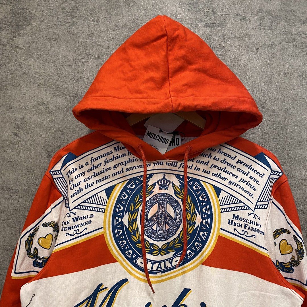Moschino Hoodie Jacket (Category: Luxury Apparel) located in Quezon City. Submitted by rebirthalley (Listing ID 1469840227, Image 2). Description: Width-21 Length-24.5 Sleeve-23 Shoulder-19 Hem-18 Brandnew with hangtag No flaws.