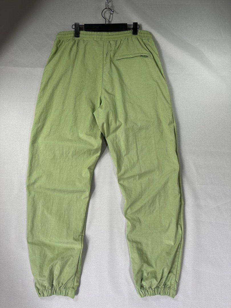 Moschino Lime Double Face Smiley Jogger Pants (Category: Joggers) located in Cabanglasan. Submitted by thefashiongarage.co (Listing ID 1469779846, Image 2). Description: Title - Moschino Couture Model/Name - Double Smiley Face Size on Tag - Medium Conditiion - Excellent as new with no issue Dimension (WxLxH) - 17x42 Inches Category- Casual Fitting - Loose Jogger Made in - Marocco Material - 100% Nylon Color - Lime Green Design - Double Smiley Fac