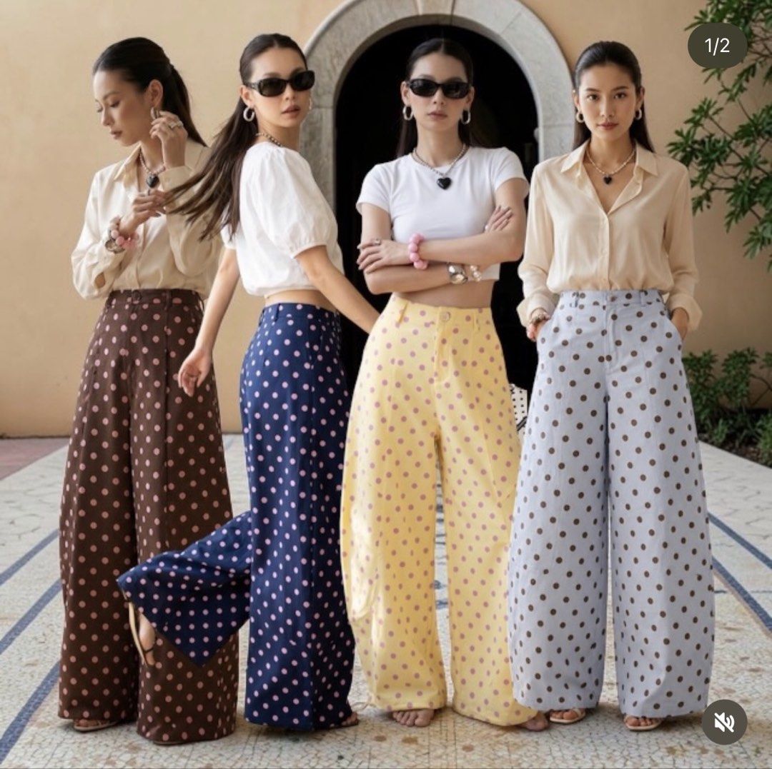 mo.studio Yellow Polka Dot Barrel Pants (Category: Skirts) located in Pasig City. Submitted by revolveisland (Listing ID 1469899572, Image 2). Description: - Brand: New with tags attached - Color/Pattern: Bright yellow with purple polka dots - Fit: High-waisted barrel fit - Details: Front pockets and secure button closure - Styling: Perfect to pair with simple crop tops or blouses.