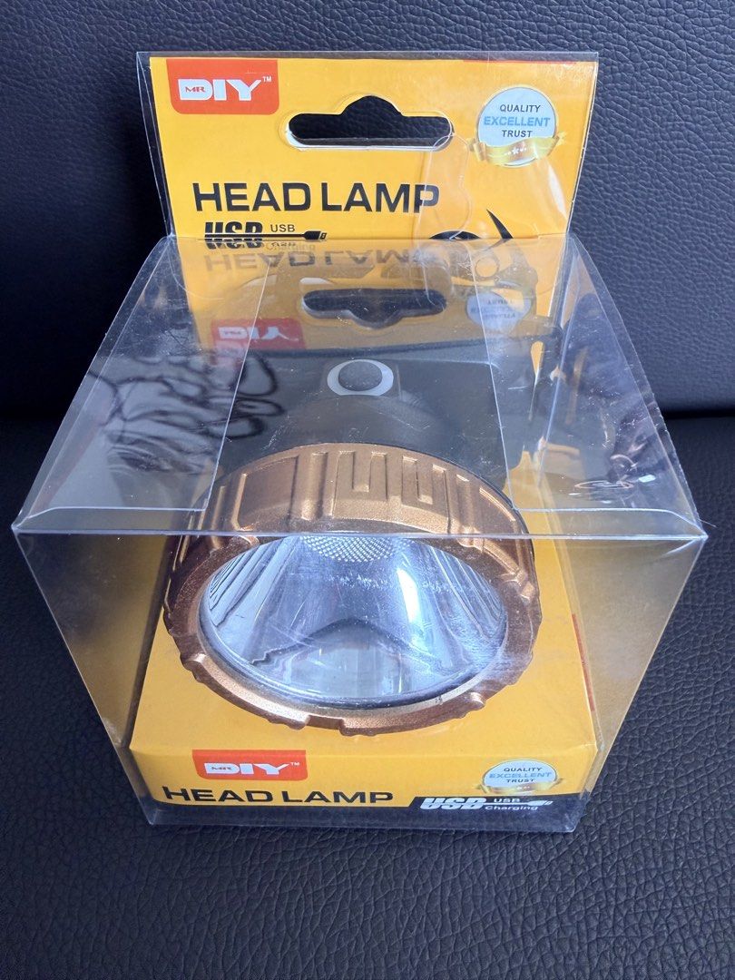MR. DIY USB Charging Head Lamp (Category: Lighting) located in Quezon City. Submitted by edenkhan (Listing ID 1469918920, Image 1). Description: - Brand: MR. DIY LED Head Lamp - Color: Stylish Gold and Black - Material: Durable, wear-resistant ABS plastic - Lighting: High brightness LED beads - Battery: Built-in 18650 lithium battery (USB rechargeable) - Condition: Brand new, still inside original plastic packaging - Ideal for: Outdoor work, camp