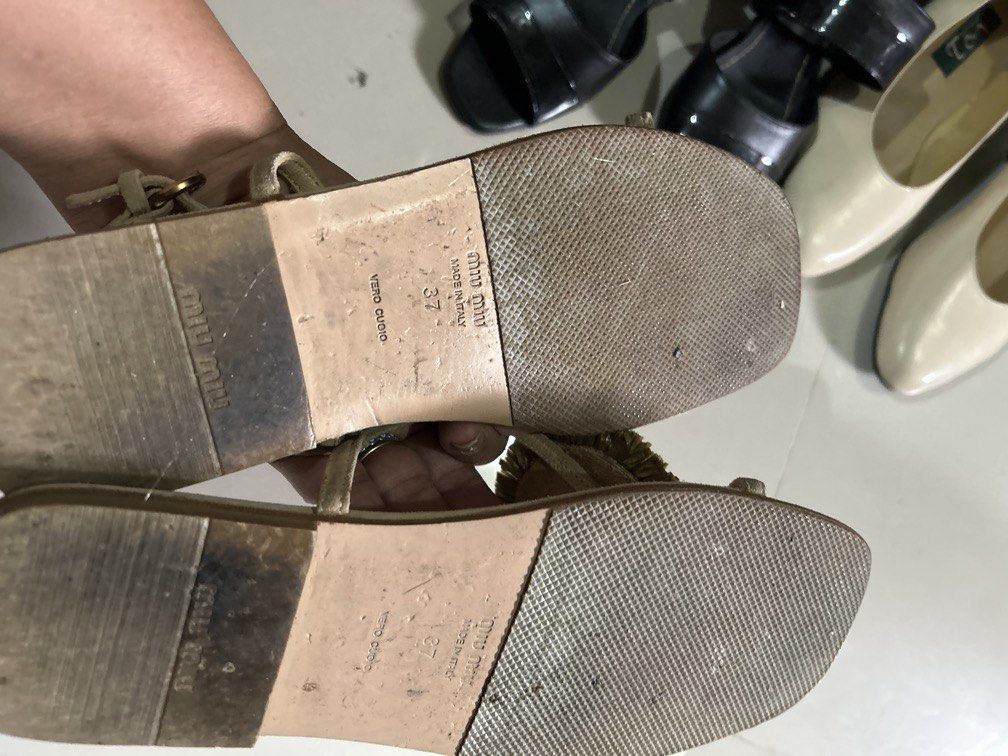 Mui Mui size 37 (Category: Flats & Sandals) located in Cavite. Submitted by cecitrifthshop (Listing ID 1469779785, Image 3). Description: pair of beige suede Miu Miu slingback sandals featuring a toe-post design and decorative woven raffia or straw floral embellishments in green, orange, and purple.made in italy size 37.