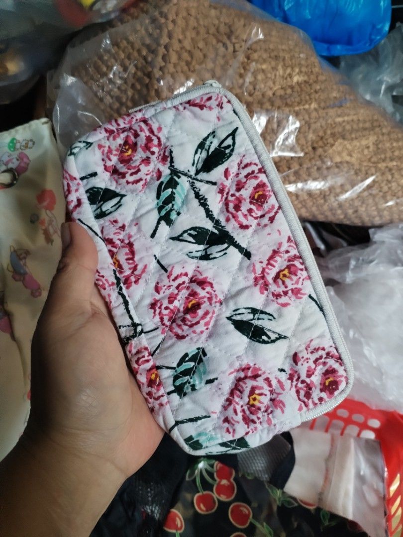 NaRaYa Quilted Floral Cosmetic Pouch (Category: Purses & Pouches) located in La Trinidad. Submitted by malditas (Listing ID 1469918964, Image 1). Description: - Brand: NaRaYa (Made in Thailand) - Material: 100% Cotton with white quilted exterior - Design: Pink rose and green leaf floral pattern - Interior: Solid red lining - Closure: Top zipper - Condition: Brand new / Excellent From HT box BUY AS IS (NO RETURN, NO EXCHANGE, NO REFUND unless stat