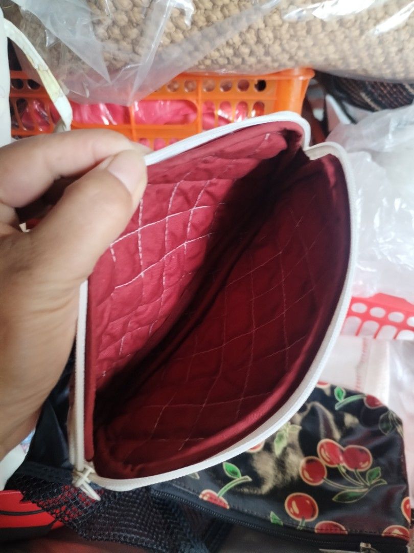 NaRaYa Quilted Floral Cosmetic Pouch (Category: Purses & Pouches) located in La Trinidad. Submitted by malditas (Listing ID 1469918964, Image 3). Description: - Brand: NaRaYa (Made in Thailand) - Material: 100% Cotton with white quilted exterior - Design: Pink rose and green leaf floral pattern - Interior: Solid red lining - Closure: Top zipper - Condition: Brand new / Excellent From HT box BUY AS IS (NO RETURN, NO EXCHANGE, NO REFUND unless stat