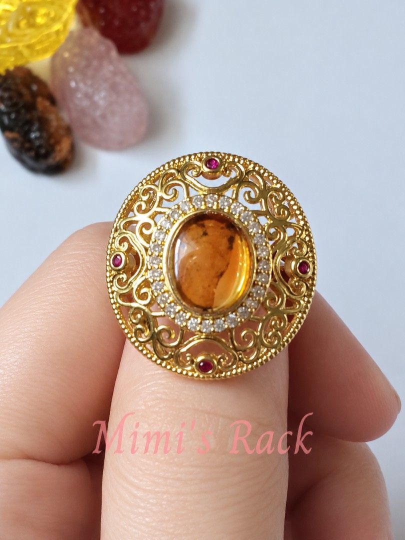 Natural Amber with Ruby Accents with Certificate of Authenticity (Category: Rings) located in Taguig. Submitted by mimisrack (Listing ID 1469815102, Image 1). Description: 🧡🛡️ Protection & Security — amber is traditionally associated with protection and grounding, while ruby symbolizes strength and courage. 💰 Wealth & Prosperity — amber represents abundance and good fortune, while ruby symbolizes ambition and success. ❤️ Love & Passion — ruby 