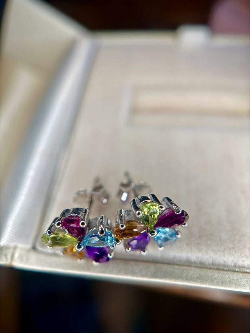 Natural Multigem Flower Stud Earrings in 925 Silver (Category: Earrings) located in Baguio. Submitted by asna_taku (Listing ID 1469843875, Image 2). Description: 🌈 Natural Multigem Flower Stud Earrings in 925 Silver 💎 COLORFUL GEMSTONE BEAUTIES! ✨🌸 Add a pop of color to your jewelry collection with these gorgeous floral stud earrings featuring a vibrant mix of colorful gemstones in beautiful purple, blue, green, and golden hues. Eye-catching y