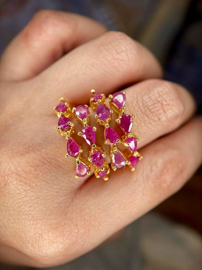 Natural Ruby Statement Ring in Gold-Plated Silver (Category: Rings) located in Baguio. Submitted by asna_taku (Listing ID 1469845517, Image 1). Description: ❤️ Natural Ruby Statement Ring in Gold-Plated Silver ❤️ Bold, vibrant, and unapologetically elegant! ✨ This eye-catching statement ring features multiple natural rubies in beautiful shades of pinkish red, arranged in a dramatic, multi-stone design with a luxurious golden finish. ❤️ Natural ru