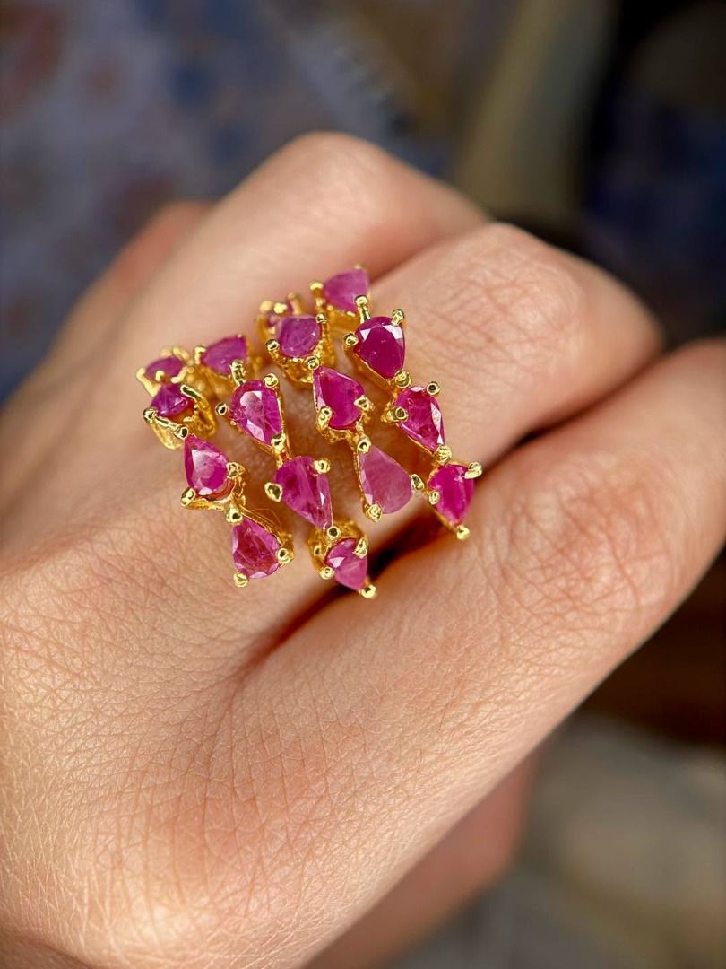 Natural Ruby Statement Ring in Gold-Plated Silver (Category: Rings) located in Baguio. Submitted by asna_taku (Listing ID 1469845517, Image 2). Description: ❤️ Natural Ruby Statement Ring in Gold-Plated Silver ❤️ Bold, vibrant, and unapologetically elegant! ✨ This eye-catching statement ring features multiple natural rubies in beautiful shades of pinkish red, arranged in a dramatic, multi-stone design with a luxurious golden finish. ❤️ Natural ru