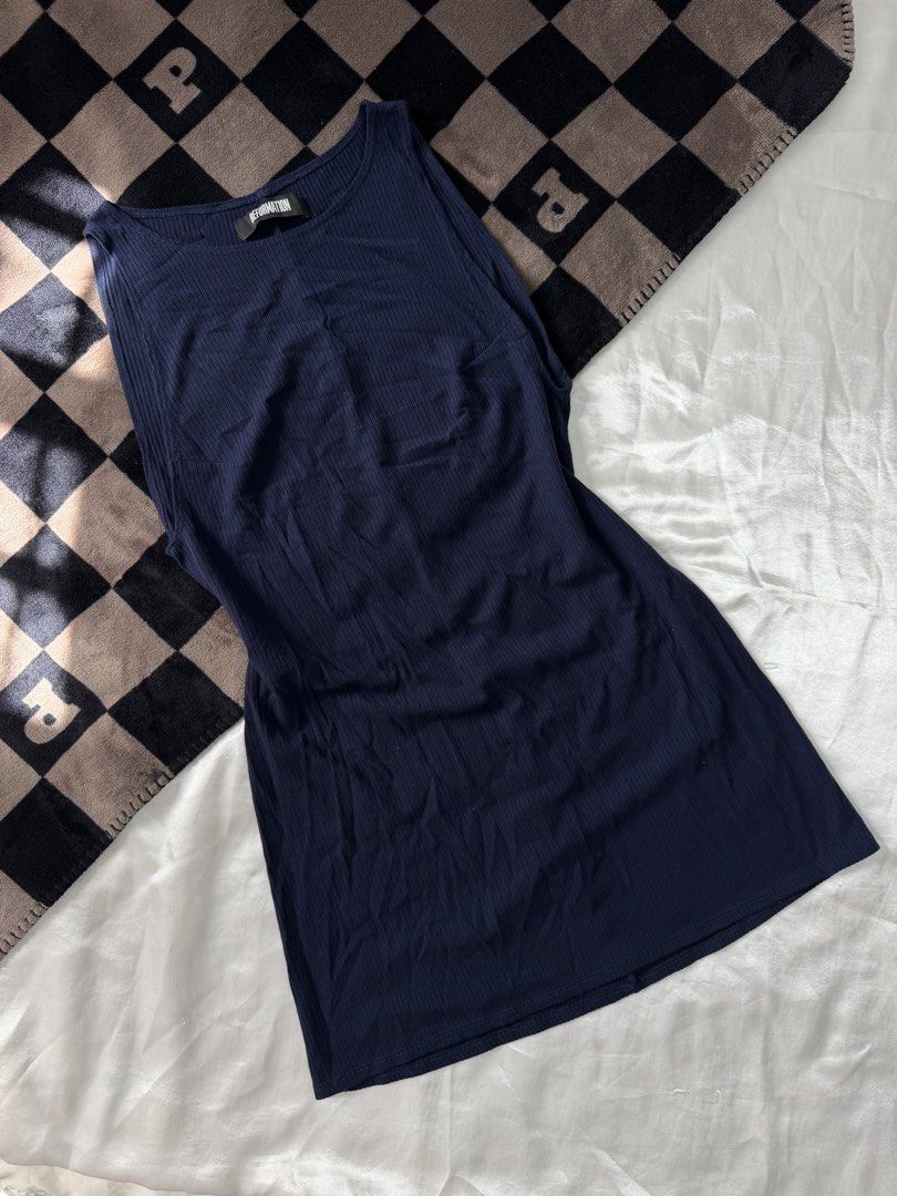 Navy blue dress (REFORMATION) (Category: Dresses) located in Bulacan. Submitted by byppishh__ (Listing ID 1469838854, Image 1). Description: Size: fits M-L Length: 31” Good as new Stretchy material The fabric is also HQ US SOURCED.