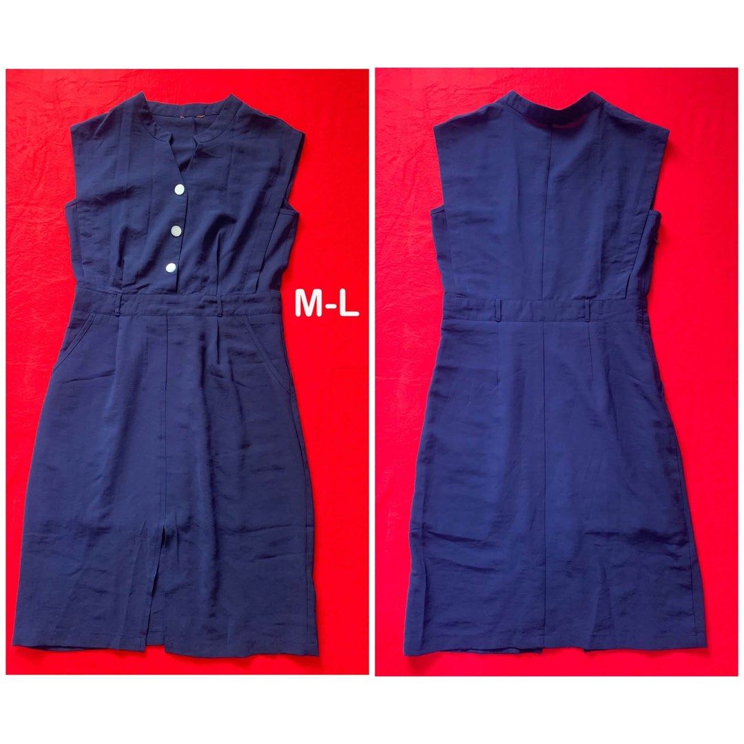 Navy Blue Sleeveless Button-Front Dress Size M-L (Category: Dresses) located in Pagadian. Submitted by cassiopeia.aphrodite458 (Listing ID 1469910026, Image 1). Description: - Color: Dark blue - Size: M-L - Design: Sleeveless with front button placket and white buttons - Fit: Fitted waist with built-in belt loops - Details: Chic front split hem and functional side pockets - Fabric: Smooth and structured.