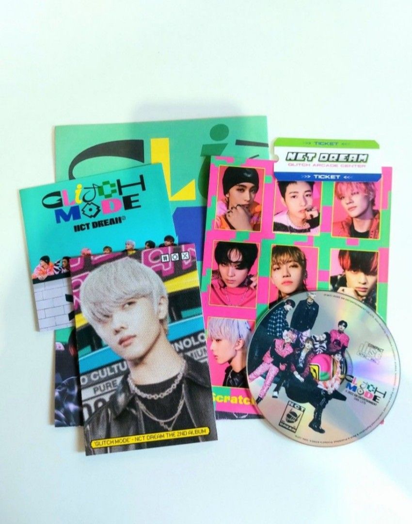 NCT DREAM: Glitch Mode (glitch version) (unsealed) (Category: K-Wave Merchandise) located in Batangas. Submitted by solanasupersale (Listing ID 1469861013, Image 2). Description: 📚 major bookshelf clean out / clearance sale ~ — unsealed — inclusion: photobook, CD, photocard set, folded poster, sticker, special ticket, — MOP: Gcash | fast shipping *feel free to send a message if you wish to negotiate the price :).